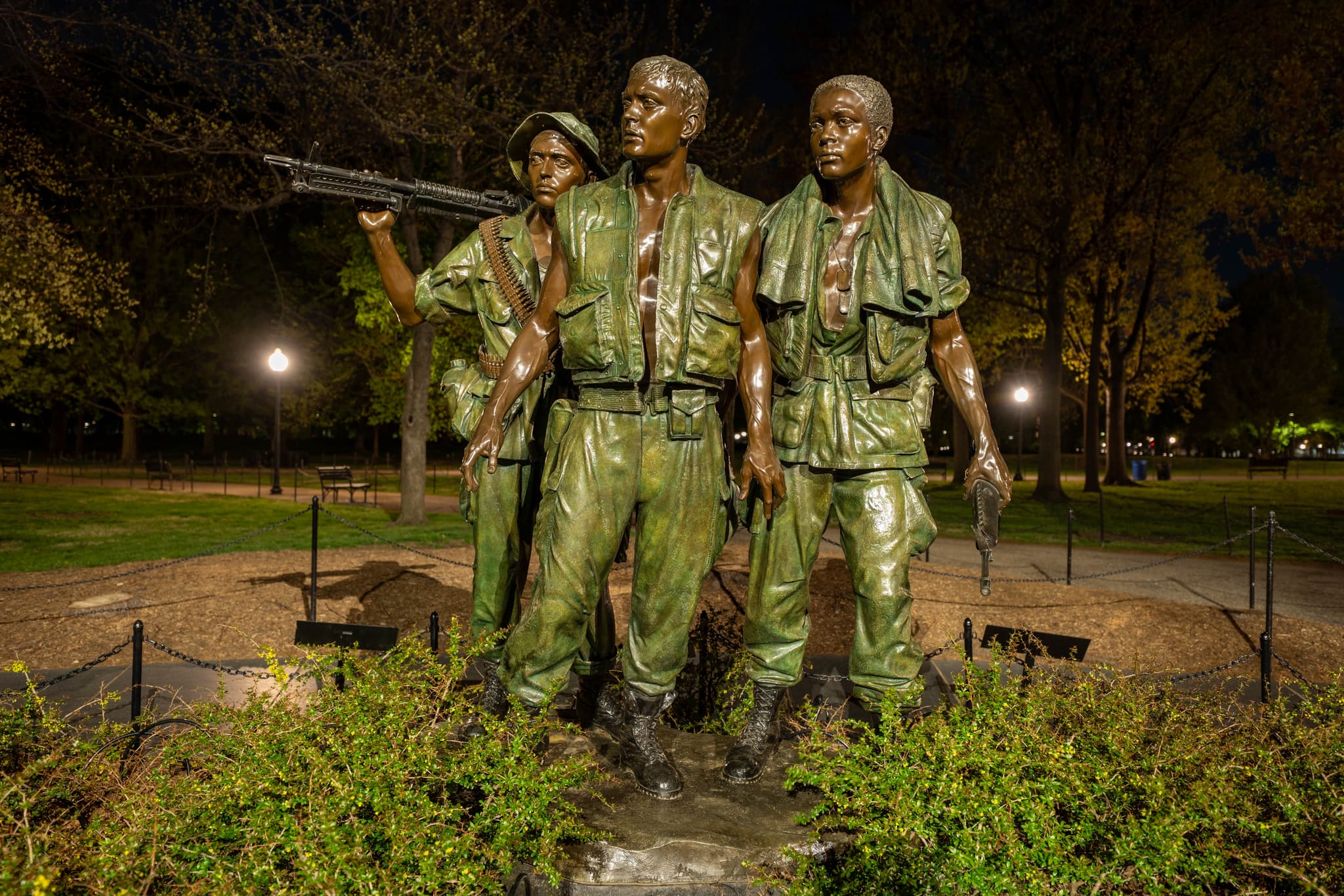 three soldiers statue at night